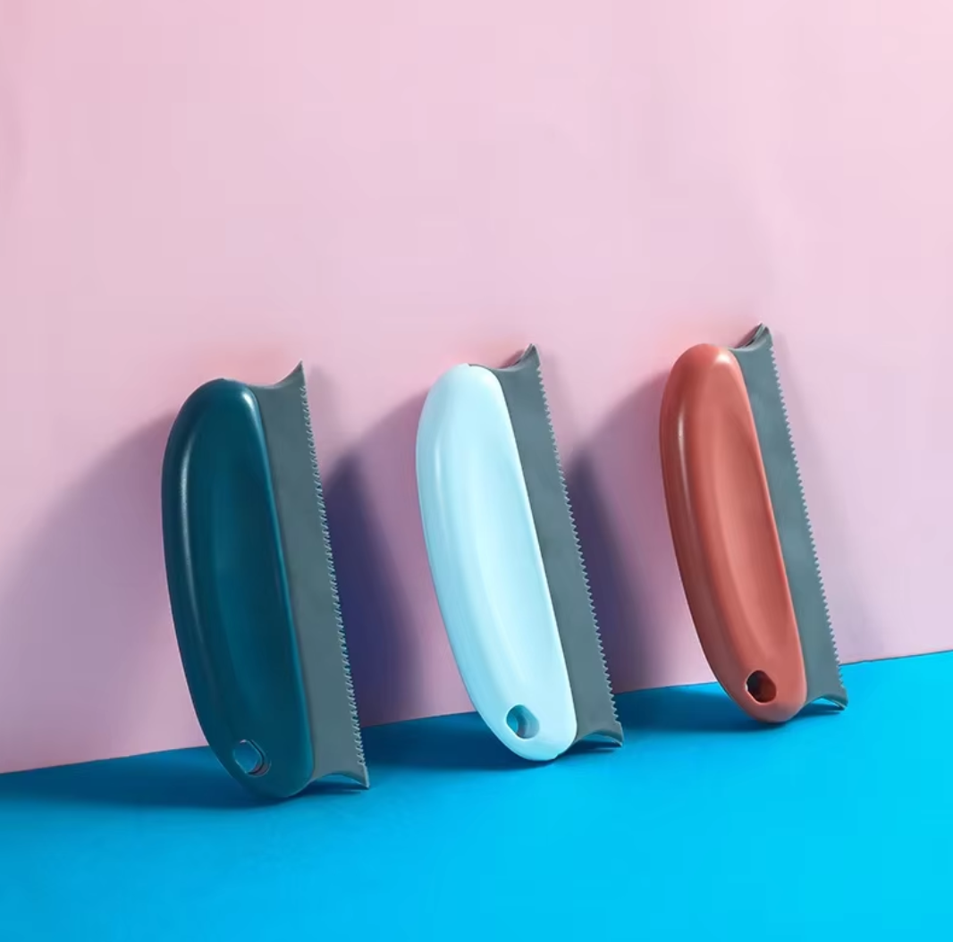 Reusable pet hair remover brush with ergonomic handle and TPR bristles