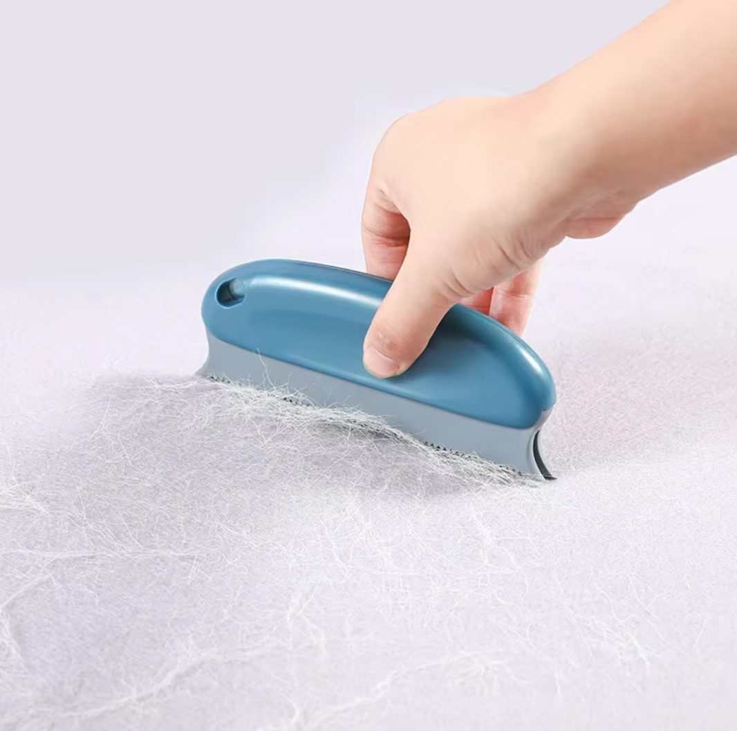 Reusable pet hair remover brush with ergonomic handle and TPR bristles