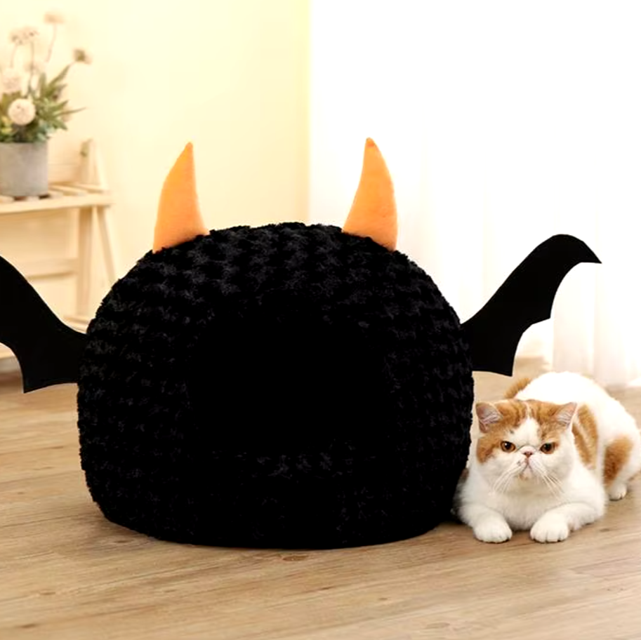 Halloween-themed imp cat house with cozy plush design for cats and small dogs.