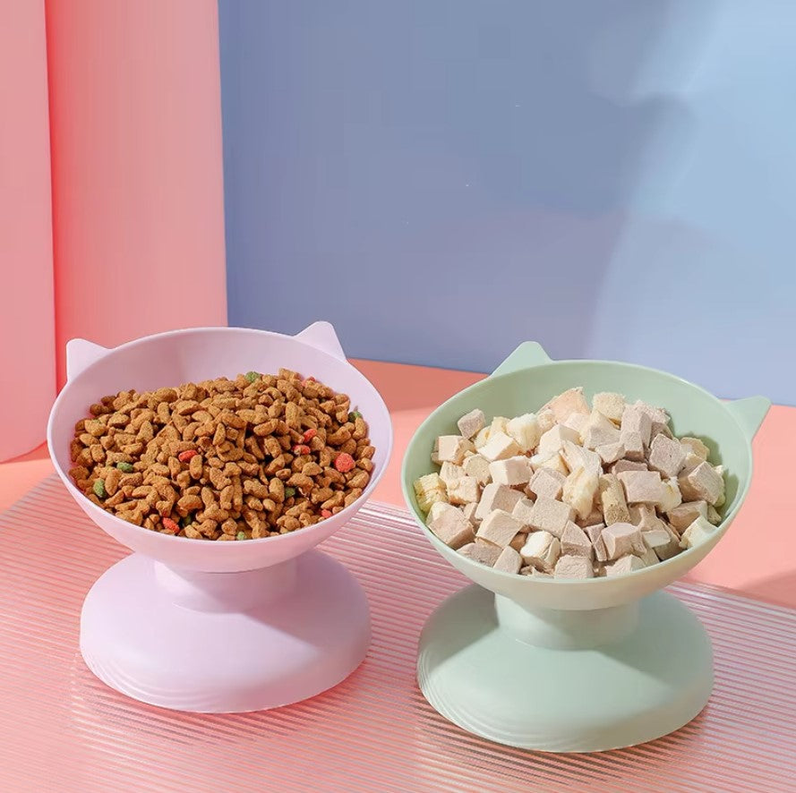 Pet bowl high bottom tilt neck protector with food for pets in ergonomic design.