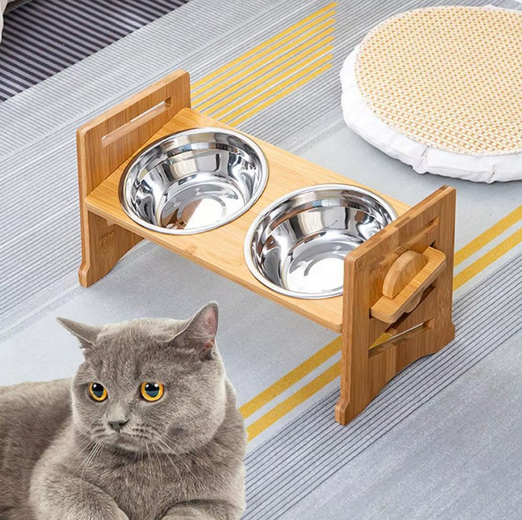 Adjustable elevated pet bowl for small dogs and cats with bamboo stand.
