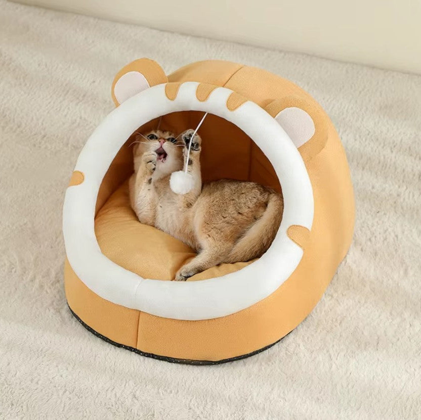 Super Cat Bed – cozy semi-enclosed plush cat cave with a cute design, featuring a playful cat inside.