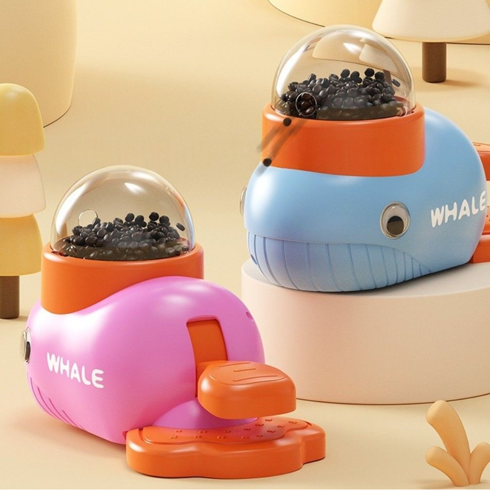 Interactive feeder featuring colorful whale designs for engaging pet mealtime.