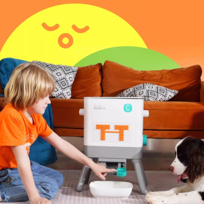 Pet feeding station with a child feeding a dog, modern design, colorful background, perfect for cats and dogs.