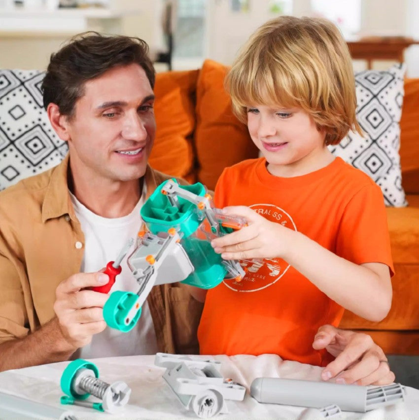 Father and son playing with pet feeding station, bonding over creative playtime activities.