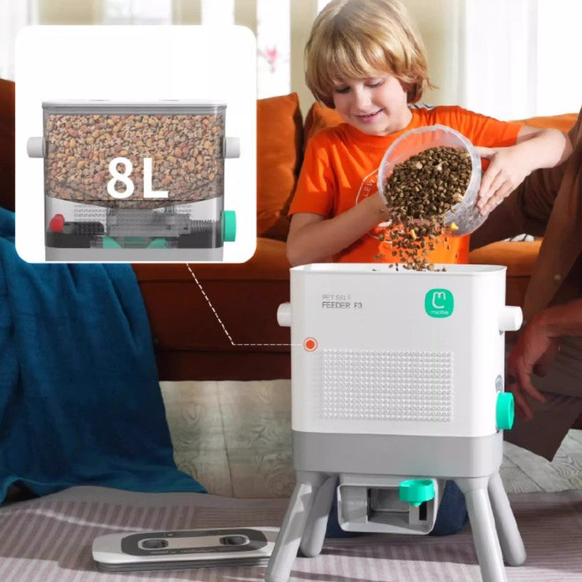 Child feeding pets with the 8L pet feeding station, showcasing a customizable design and easy meal distribution.