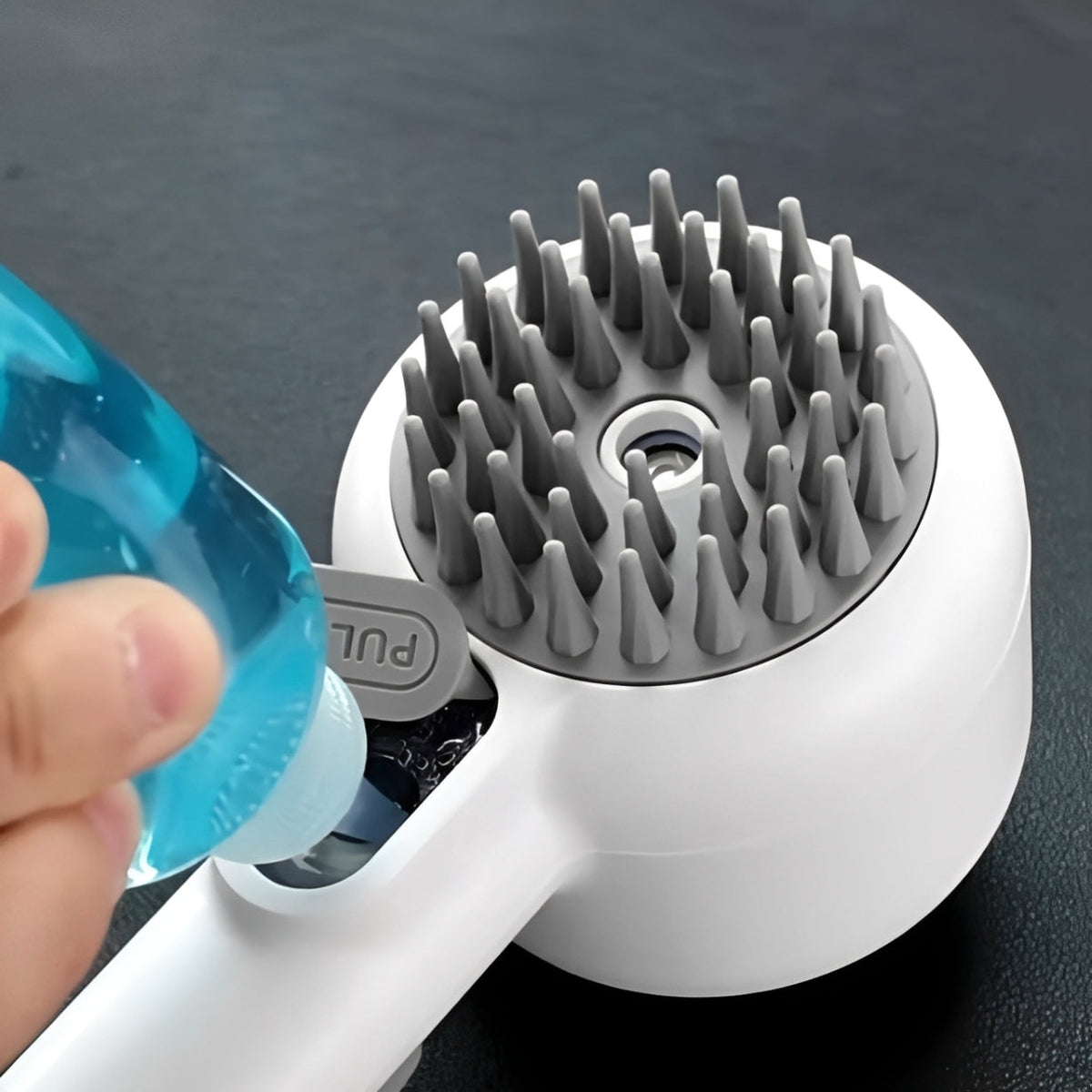 Close-up of The Artisan™ dual-sided pet grooming brush with cool mist feature, ideal for pet grooming for cats and dogs.