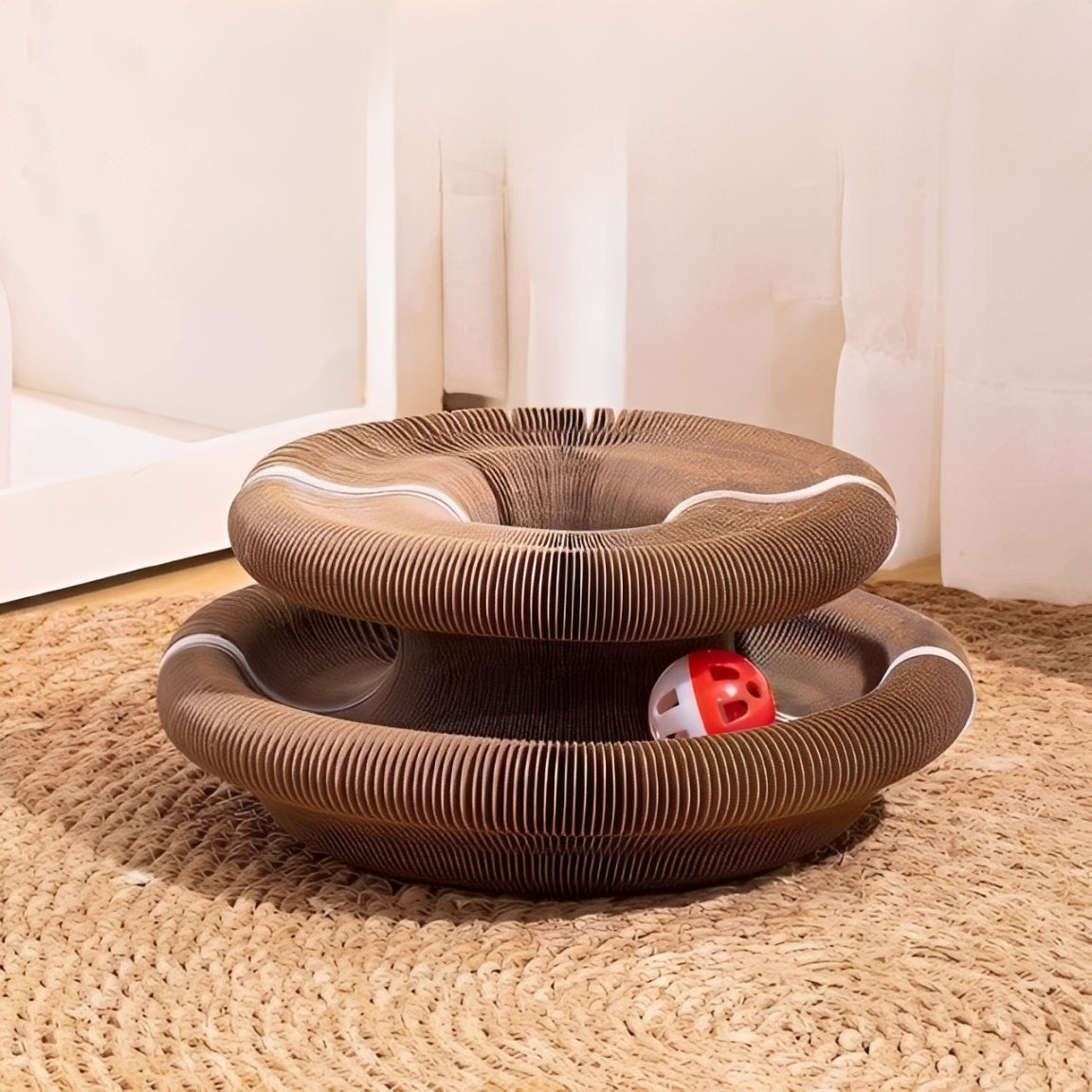 Cat scratcher with ball featuring a foldable corrugated design and a hidden jingling ball for playful scratching.