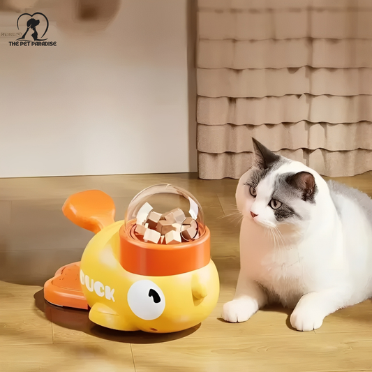 Interactive feeder for cats and dogs featuring a duck design, promoting playful and healthy eating habits.