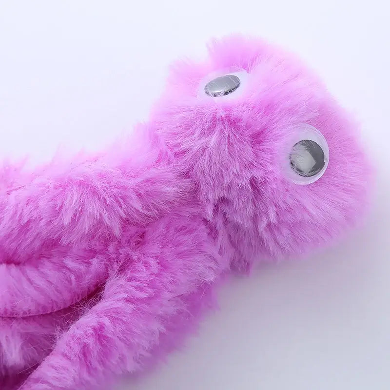Cute octopus plush toy for cats, soft and durable with dangling tentacles, designed for biting, pouncing, and cuddling.