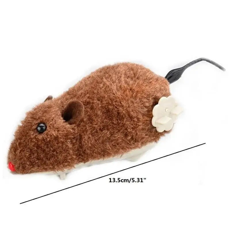 Indoor cat playing with a wind-up plush mouse toy, chasing it across the floor for hours of entertainment.