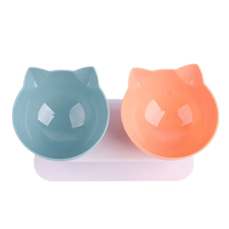 Non slip pet bowl set with cat-shaped bowls in blue and orange color on a white stand.