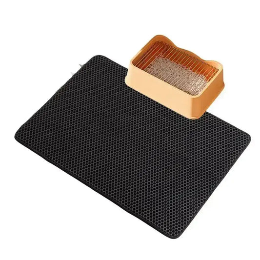 Double-layer waterproof cat litter mat with non-slip EVA design, traps litter and protects floors from dirt and moisture.