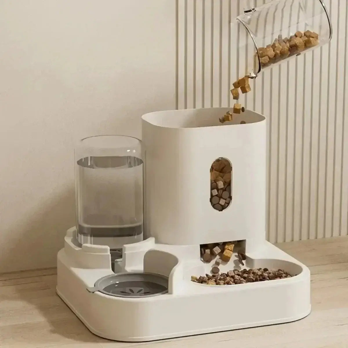 Non-electric automatic pet feeder and water dispenser with raised dual bowl design for cats and dogs.