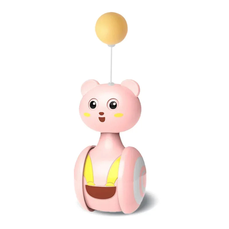 Interactive tumbler cat toy with a pink bear design, featuring a spinning ball for cat entertainment.