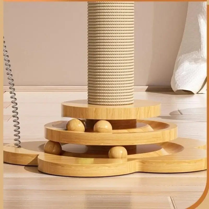 Wooden interactive cat turntable toy with rotating ball track and built-in sisal scratching board.