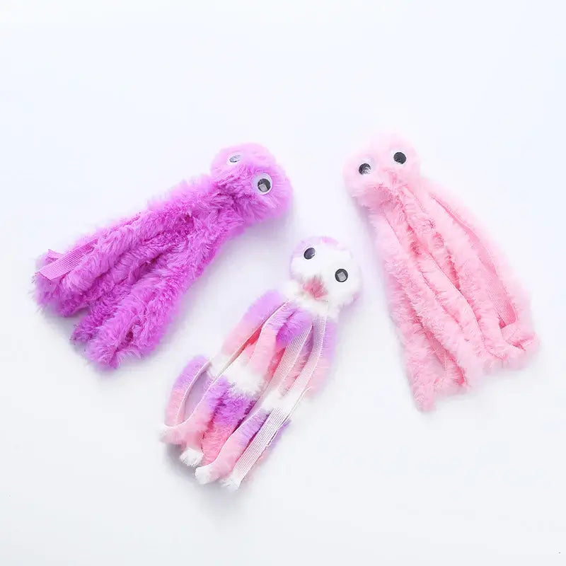 Cute octopus plush toy for cats, soft and durable with dangling tentacles, designed for biting, pouncing, and cuddling.
