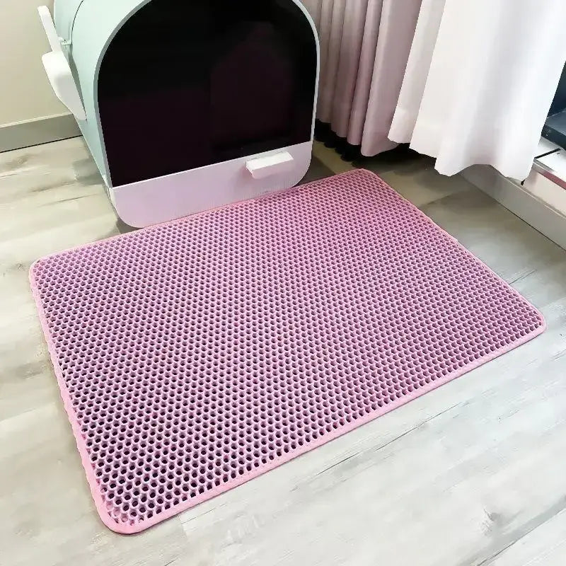 Double-layer waterproof cat litter mat made of soft EVA material for easy litter collection and floor protection.