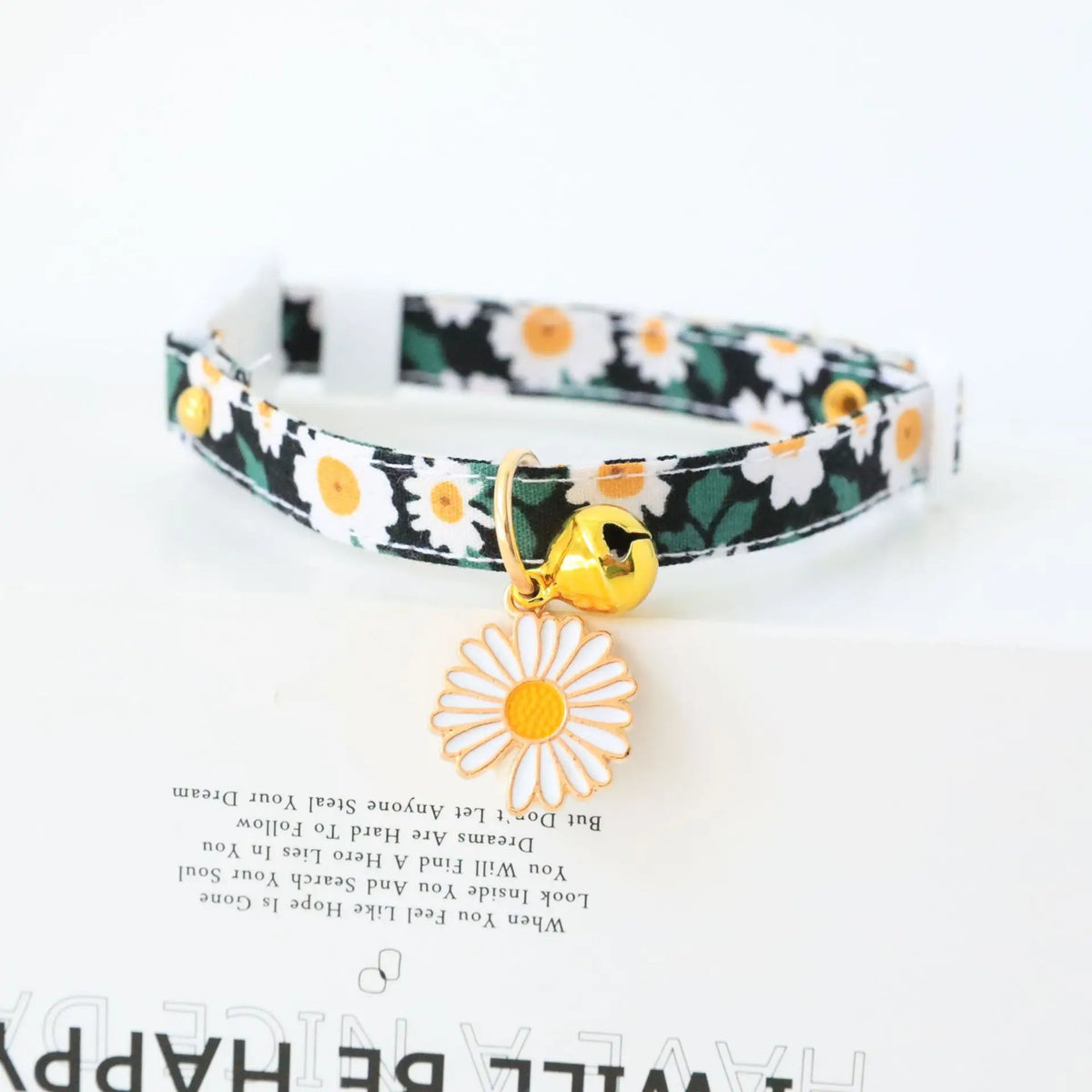 Reflective plaid cat collar with bow and daisy charm for small pets