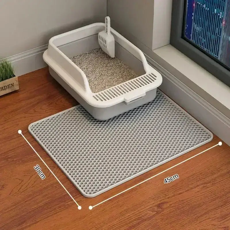 Double-layer waterproof cat litter mat with non-slip EVA design, traps litter and protects floors from dirt and moisture.