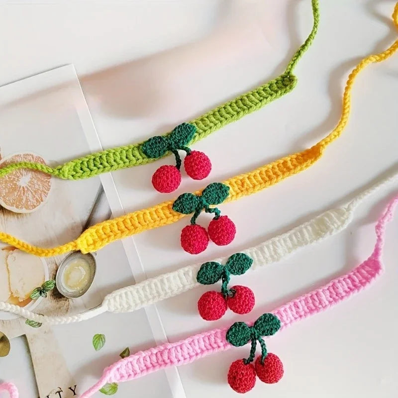 Handmade knitted pet collar with cherry decoration for cats
