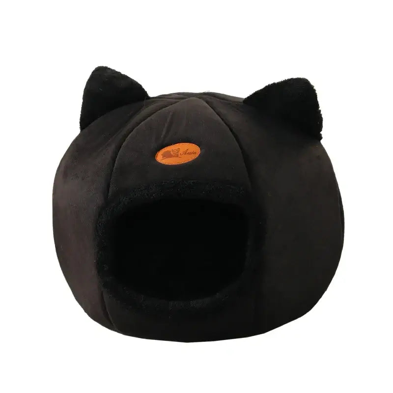 Deep sleep comfort cat bed in cave design, made with soft plush material and non-slip base for warm, cozy winter sleep.
