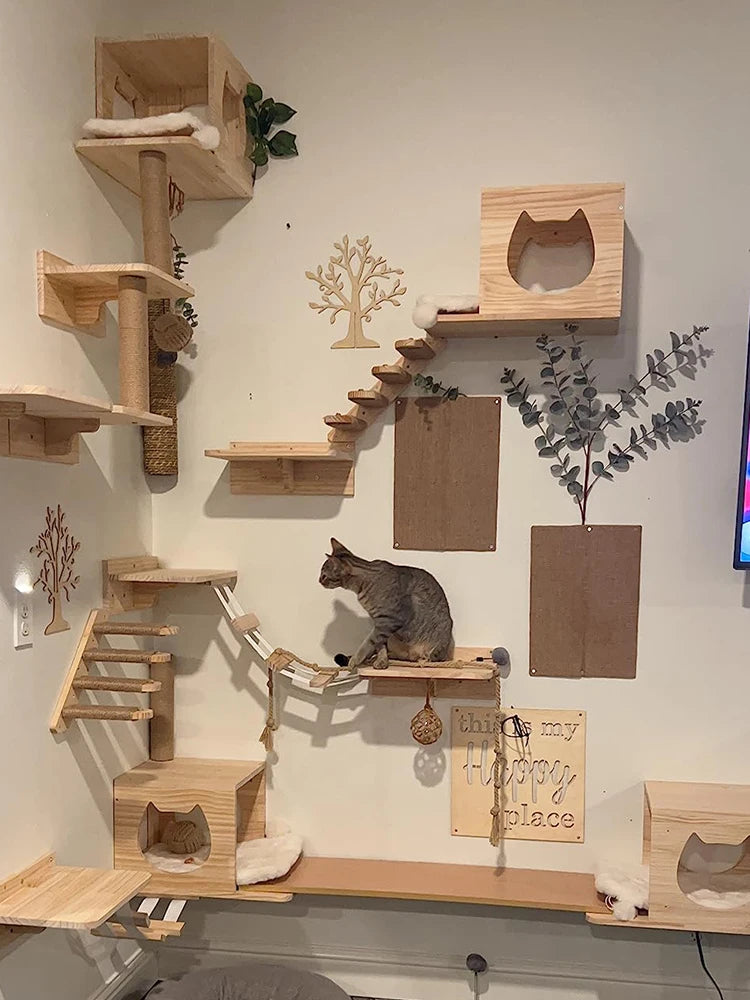 Wall-mounted cat shelf with sisal scratching posts and multi-level steps