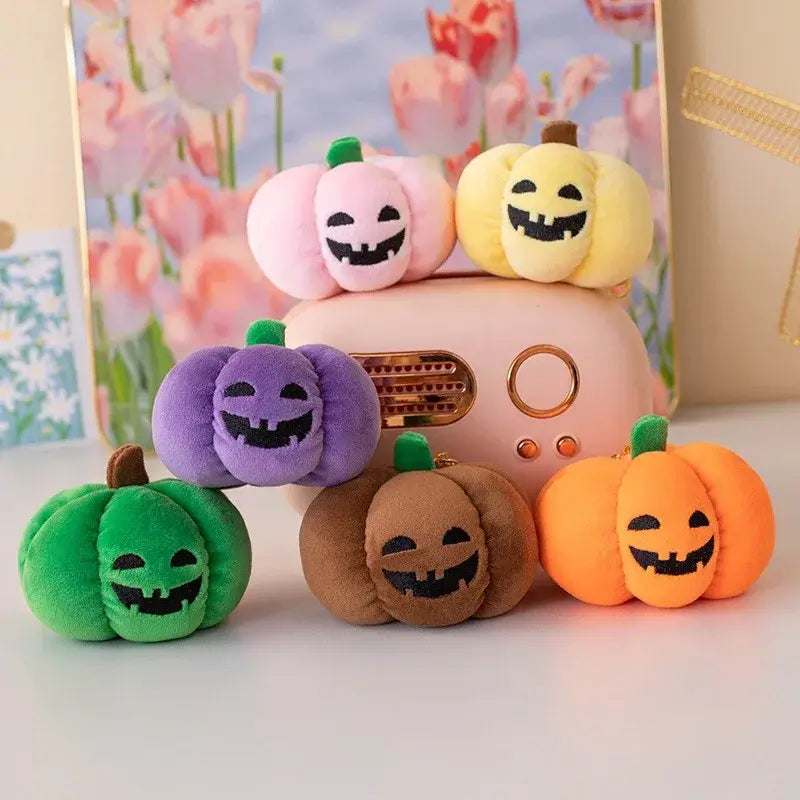 Small dog cuddling a Halloween pumpkin plush toy with night light.