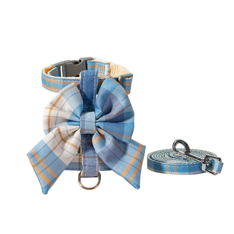 Pet harness with breast strap and stylish blue plaid bow, includes matching leash for cats and dogs.