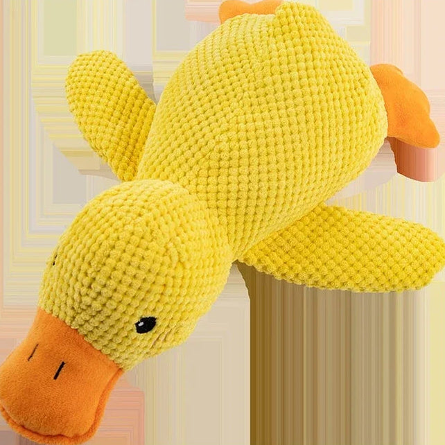 Calming pet toy in the shape of a yellow duck, soft and durable plush chew toy for cats and dogs.