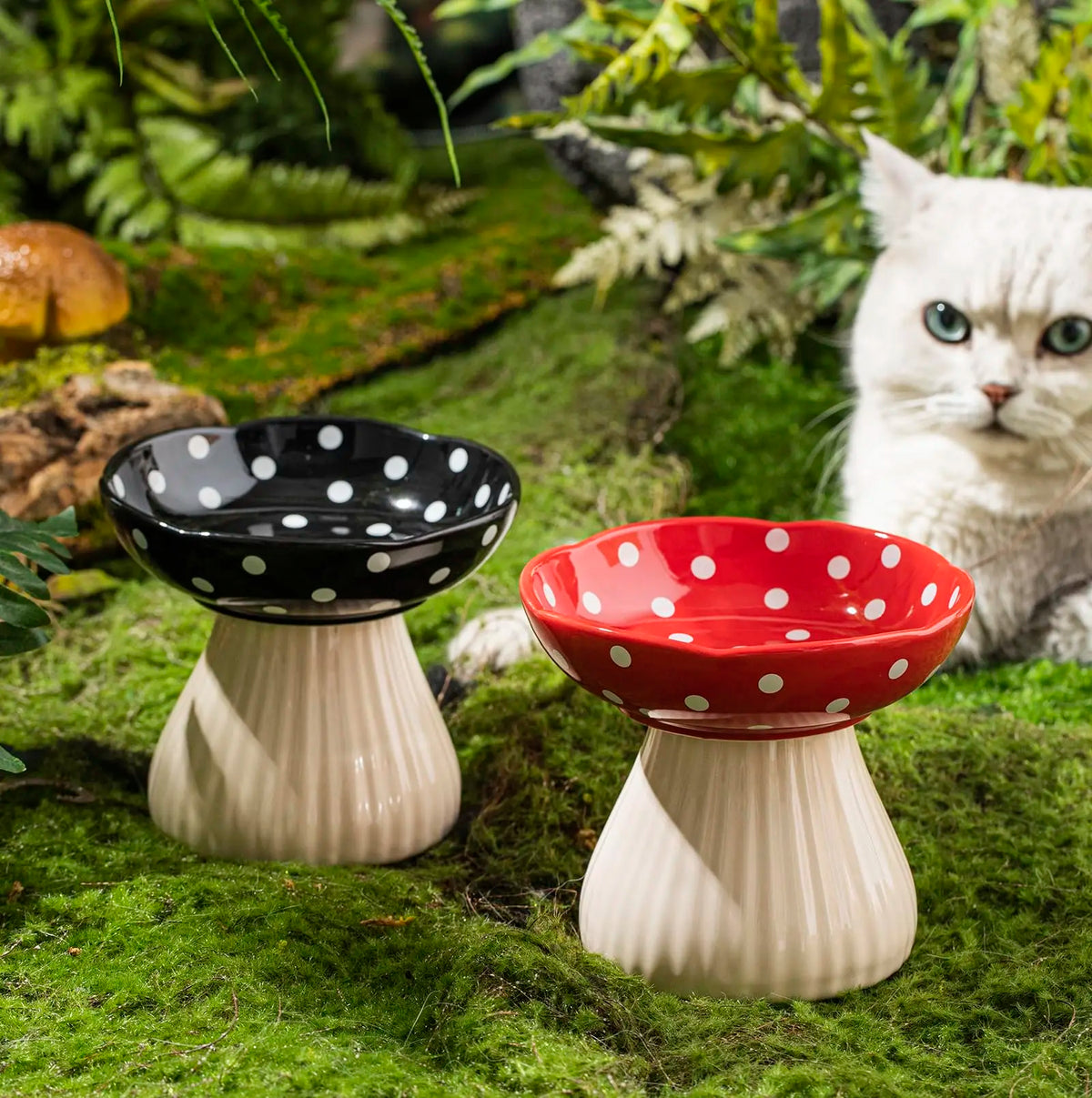 Ceramic cat feeder with mushroom elevated shelf in black and red polka dot design, perfect for comfortable cat meals.