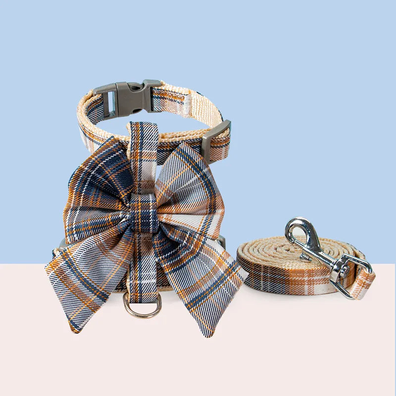 Pet harness with breast strap and matching leash, stylish design with plaid bow for pets.