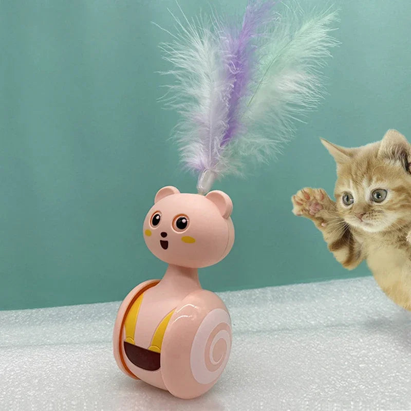Interactive tumbler cat toy with feather wand, designed to engage energetic felines in play.
