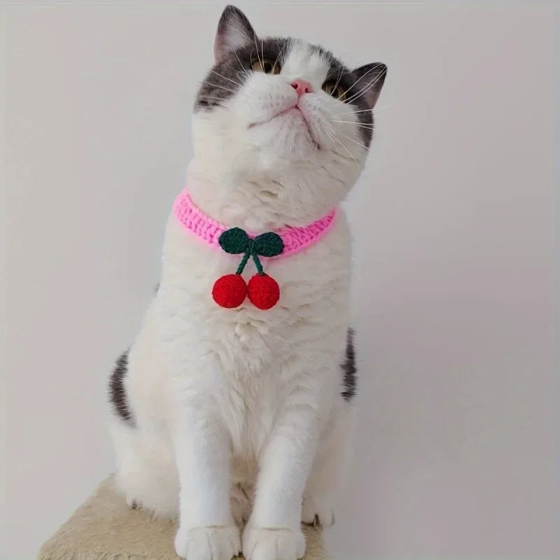 Handmade knitted pet collar with cherry decoration for cats