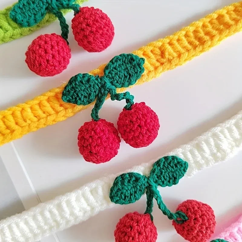 Handmade knitted pet collar with cherry decoration for cats