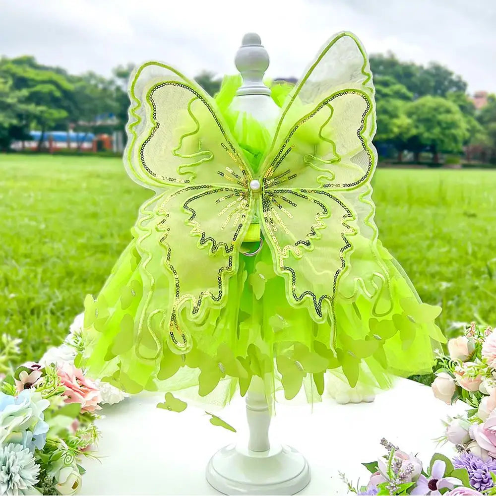 Small dog wearing the Butterfly Princess Dress, showcasing a charming and stylish design perfect for special occasions.