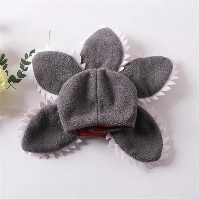 Cat wearing a scary flower Demogorgon cosplay hat for Halloween or costume party