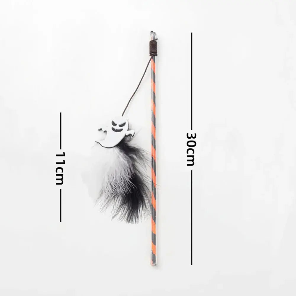 Halloween-themed cat teaser wand with pumpkin, ghost, feathers, and bell.