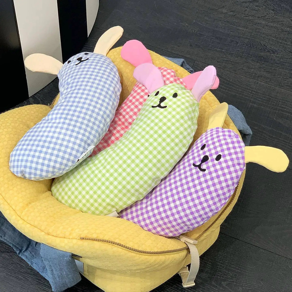 U-shaped cotton pet pillow for cats and dogs with removable washable cover, ideal for chin support and deep sleep.