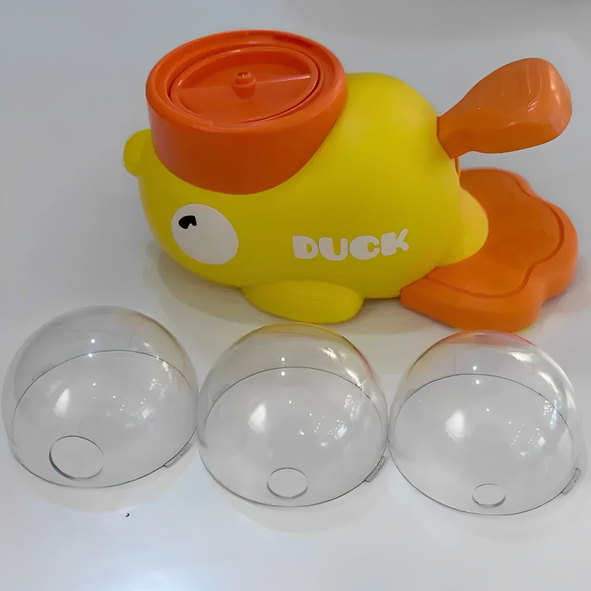 Interactive feeder shaped like a duck with three transparent snack containers.