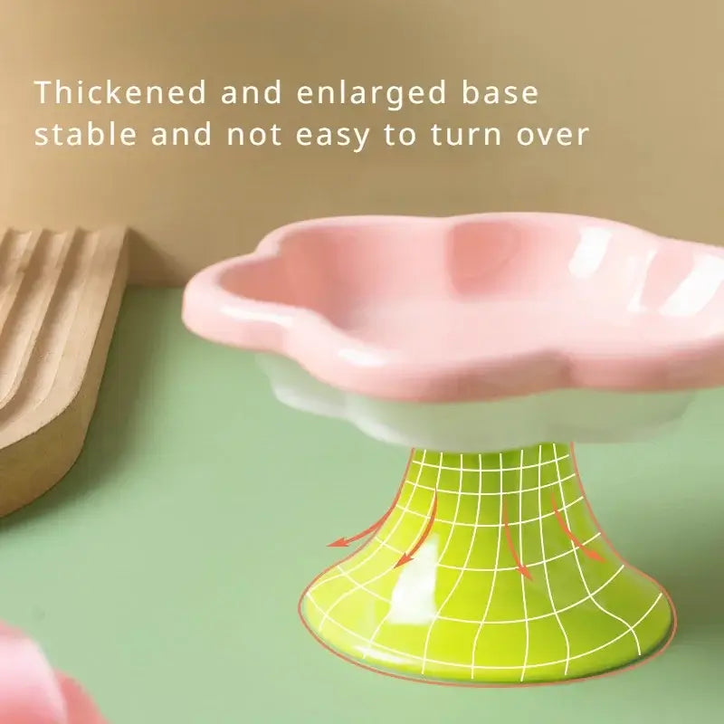 Elevated ceramic cat bowl with elegant flower design for comfortable and healthy feeding.